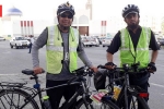 cycling to mecca, cycling to hajj, two indian men cycling to mecca for haj while fasting for ramadan, Mecca